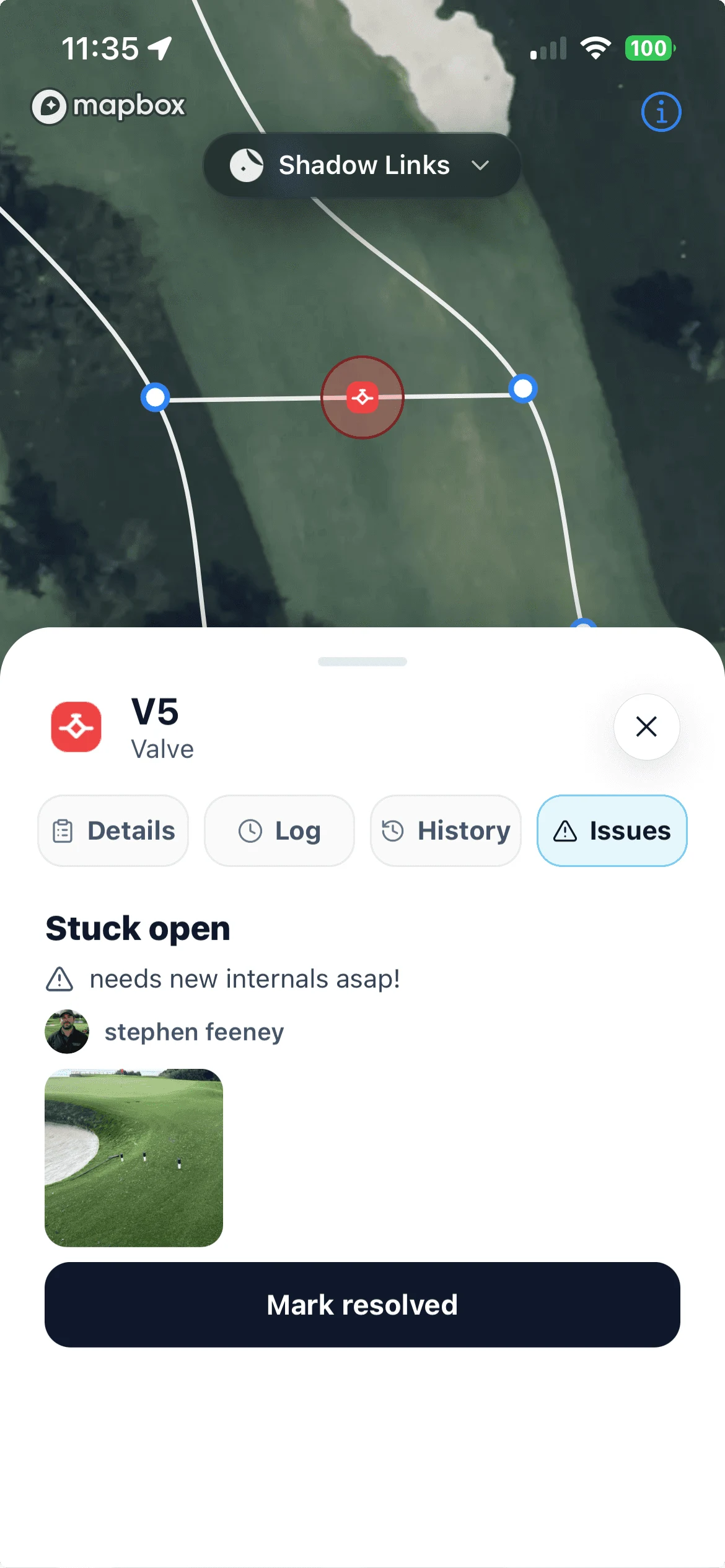 An open valve issue with a note and photo in the Turfile mobile app