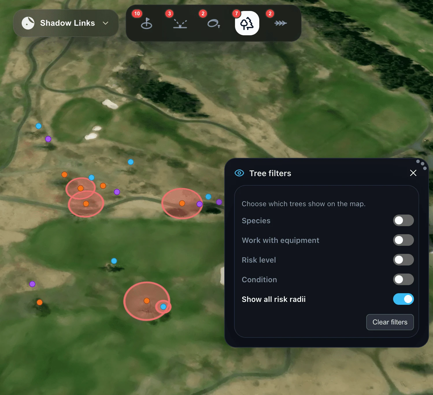 Tree pins with hazard risk radii on the Turfile map